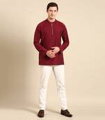 the short kurta is perfect outfit for semi cocktail party when its paired with black formal trouser.