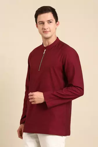 the short kurta is perfect outfit for semi cocktail party when its paired with black formal trouser.