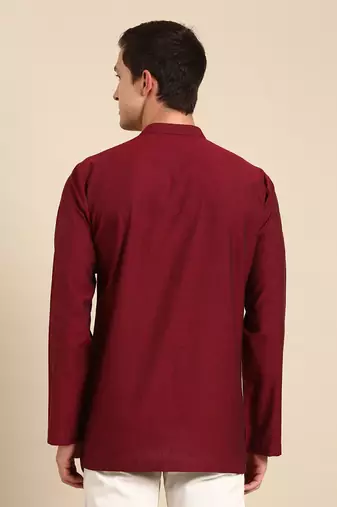 the short kurta is perfect outfit for semi cocktail party when its paired with black formal trouser.