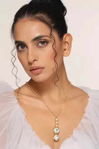 Gold tone polki pendant with chain
