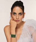 Green and white gold tone pearl bracelet