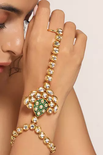 Green gold tone kundan hathphool