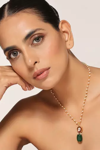 Green gold tone kundan pendant with chain