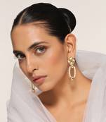 White gold tone kundan and pearl earrings