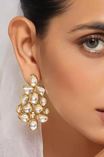 Gold tone kundan dangler earrings