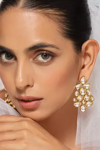 Gold tone kundan dangler earrings