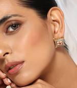 Red gold tone kundan studs