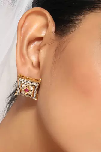 Red gold tone kundan studs
