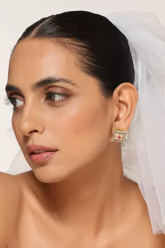 Red gold tone kundan studs