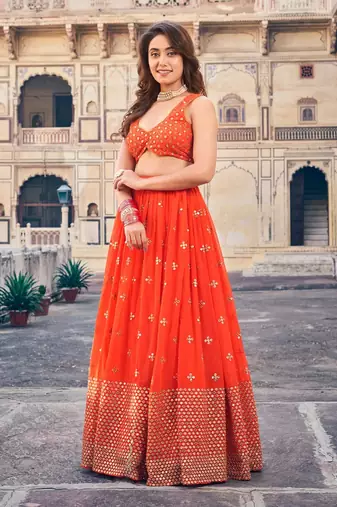 Orange Sequine Embroidered Work Georgette Fabric Wedding Lehenga Choli With Dupatta Semi Stitched.