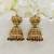Gold antique lakshmi temple jhumka earring with red and green beads