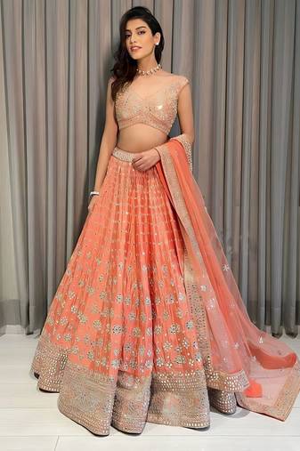 Orange Sequins and Zari  Embroidered Devsena Silk Party wear Lehenga Choli