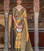 Yellow color silk blend ajarak design saree
