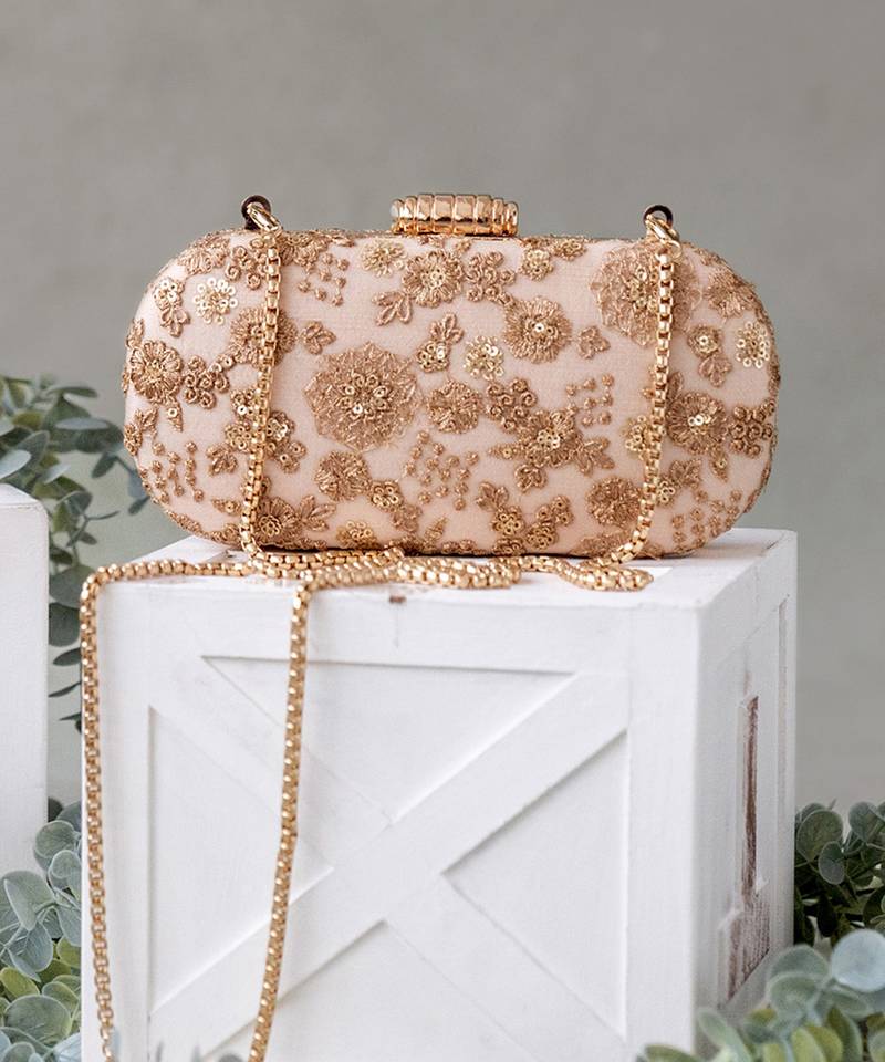 Beige embroidered ada capsule clutch