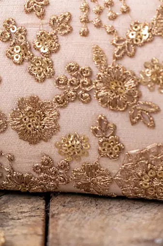 Beige embroidered ada capsule clutch