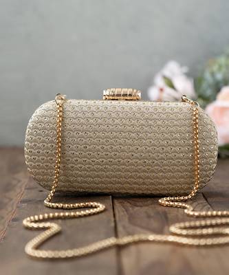 Champagne light gold capsule clutch 1