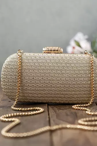 Champagne light gold capsule clutch