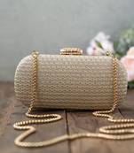 Champagne light gold capsule clutch