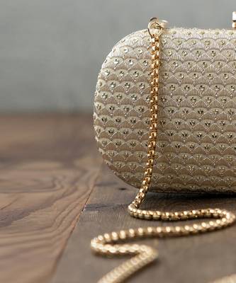 Champagne light gold capsule clutch 2