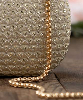 Champagne light gold capsule clutch 3