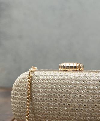Champagne light gold capsule clutch 4