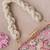 Pink elora clutch