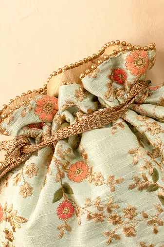 Mint floral creeper potli bag