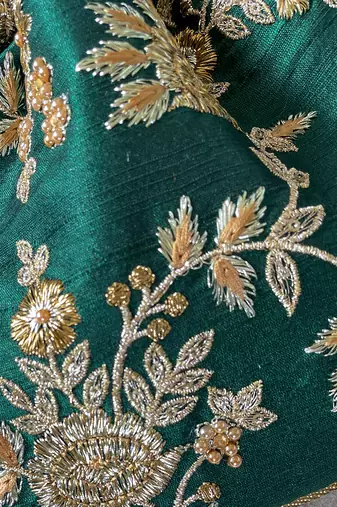 Green embroidered potli bag