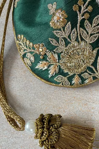 Green embroidered potli bag