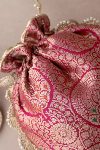 Dark pink kashi banarasi silk potli bag
