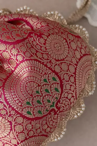 Dark pink kashi banarasi silk potli bag