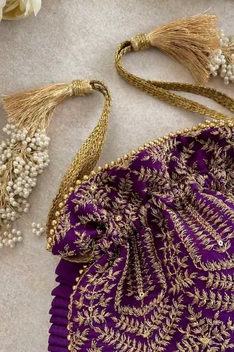 Purple leela heritage potli bag