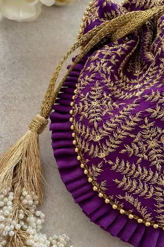 Purple leela heritage potli bag