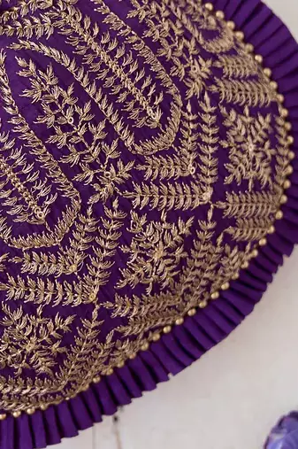 Purple leela heritage potli bag