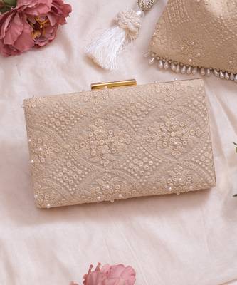 Beige oyster pearl clutch 1