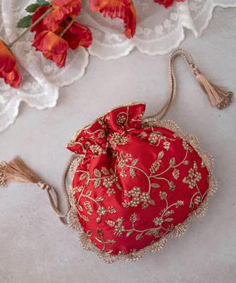 Red embroidered pearl potli bag 1
