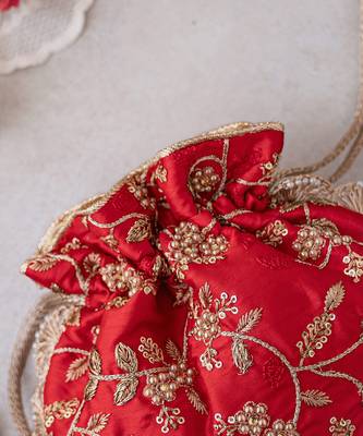 Red embroidered pearl potli bag 2