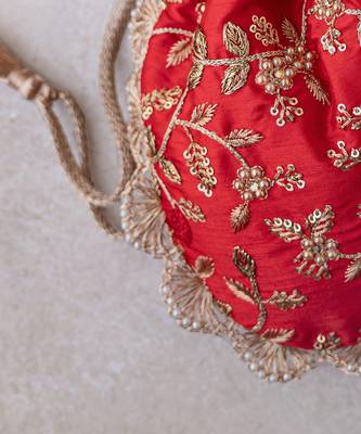 Red embroidered pearl potli bag 3