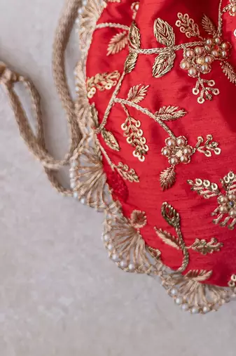 Red embroidered pearl potli bag