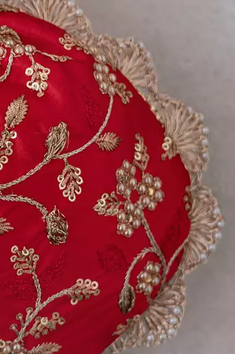 Red embroidered pearl potli bag