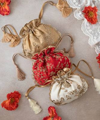 Red embroidered pearl potli bag 5