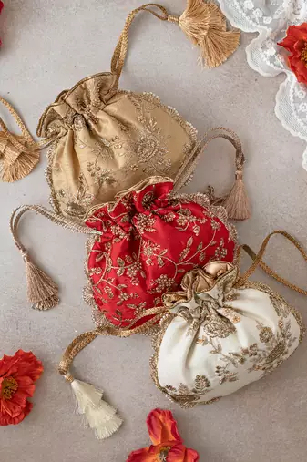 Red embroidered pearl potli bag