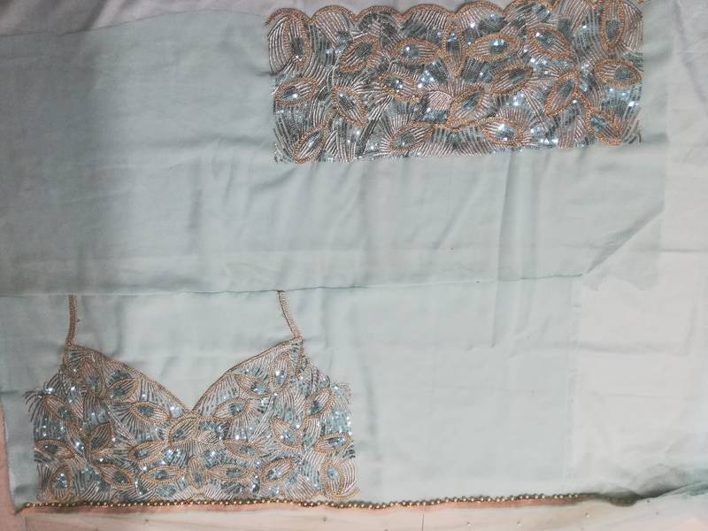 Turquoise Crush Work Sequins Zari And Dori Embroidered Faux Georgette Party Wear Lehenga Choli