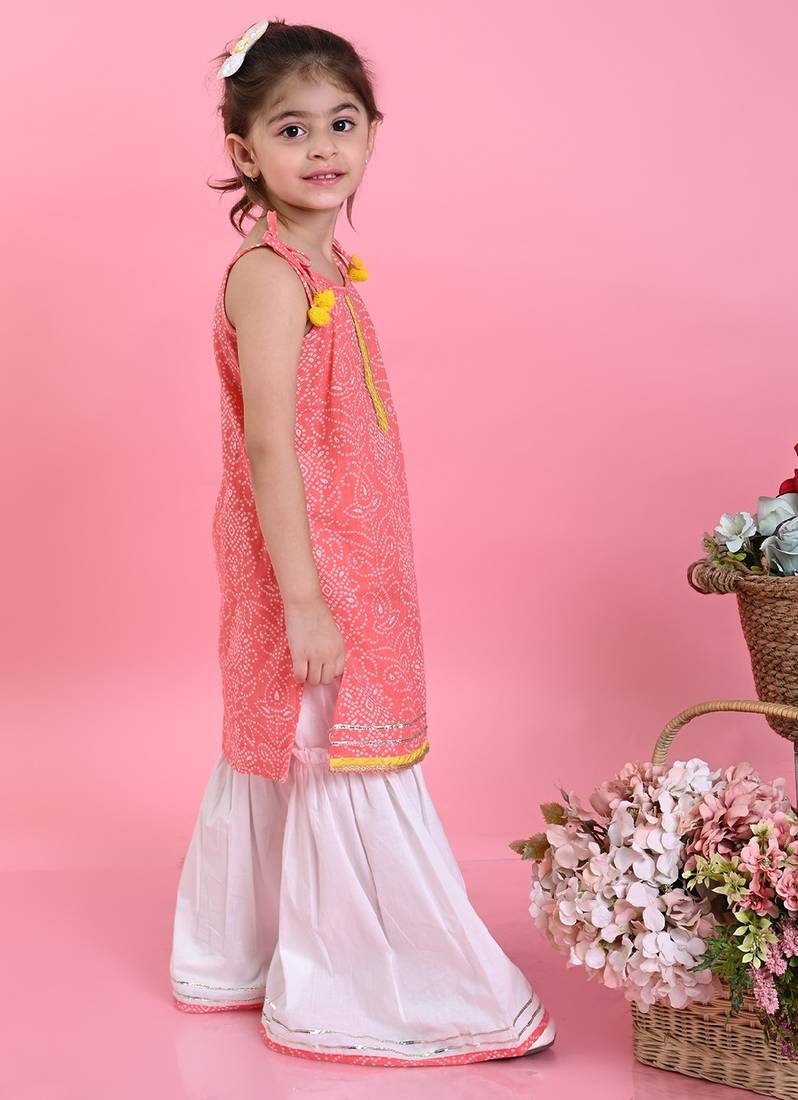 Saka Designs Girls Orange Bandhani With White Sharara