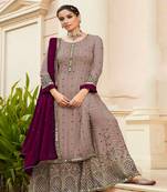 Light brown color embroidered faux georgette semi stitched sharara suit