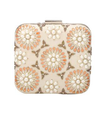 Cream symmetry clutch 1