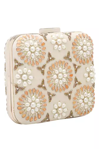 Cream symmetry clutch