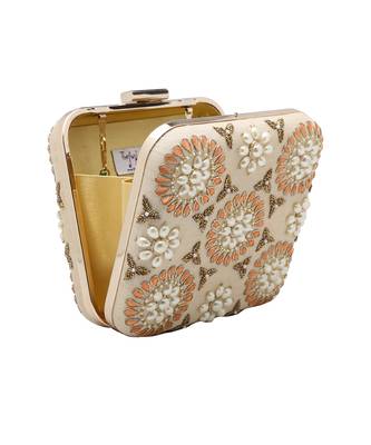 Cream symmetry clutch 4