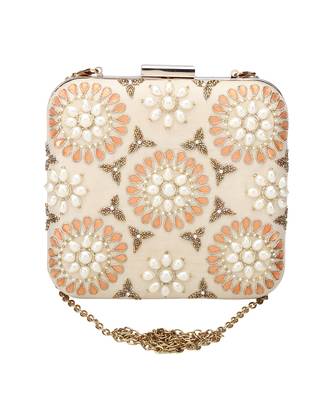 Cream symmetry clutch 5