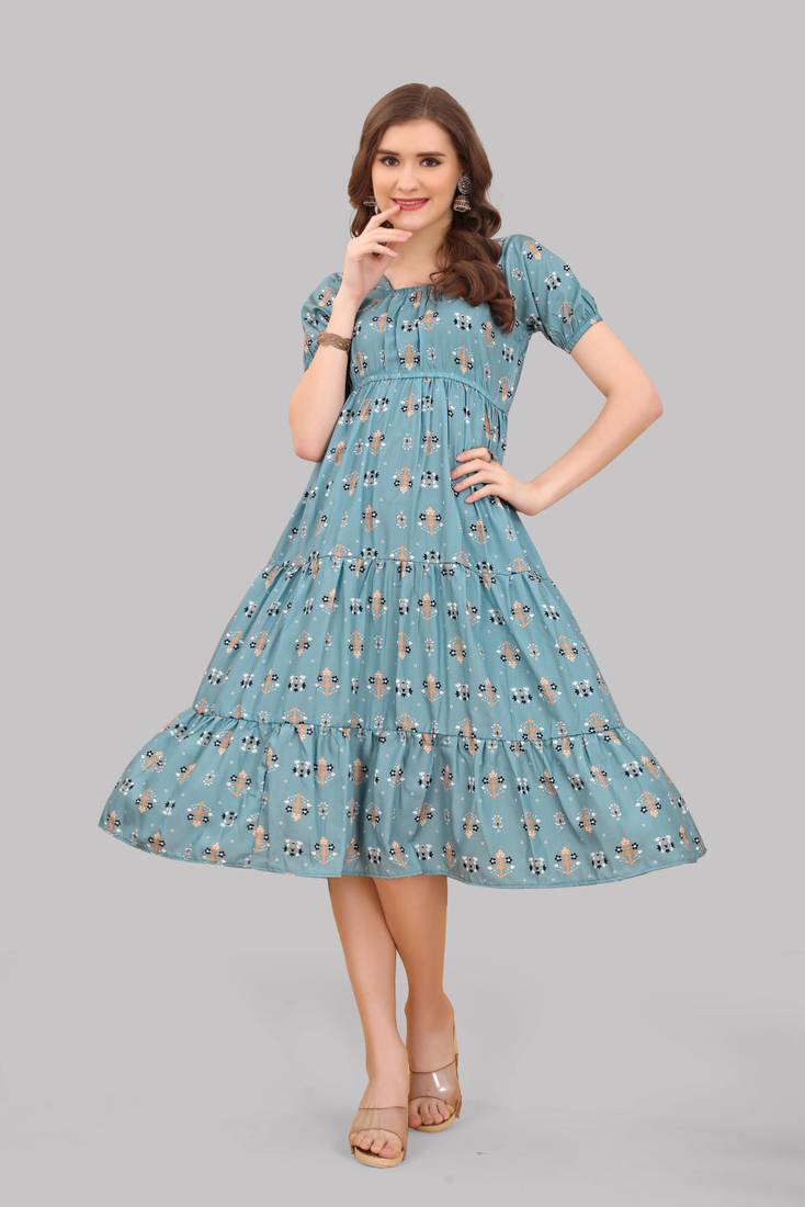 Blue cotton anarkali printed half sleeve round neck floral print kurti that you might like